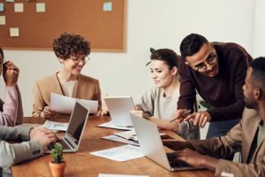 A group of young executives having a meeting to discuss a project